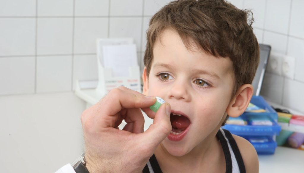 child_takes_pills