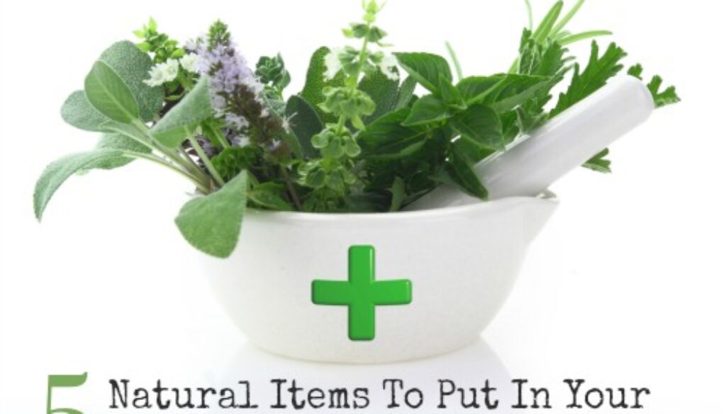 Porcelain mortar with pharmacy cross and fresh herbs