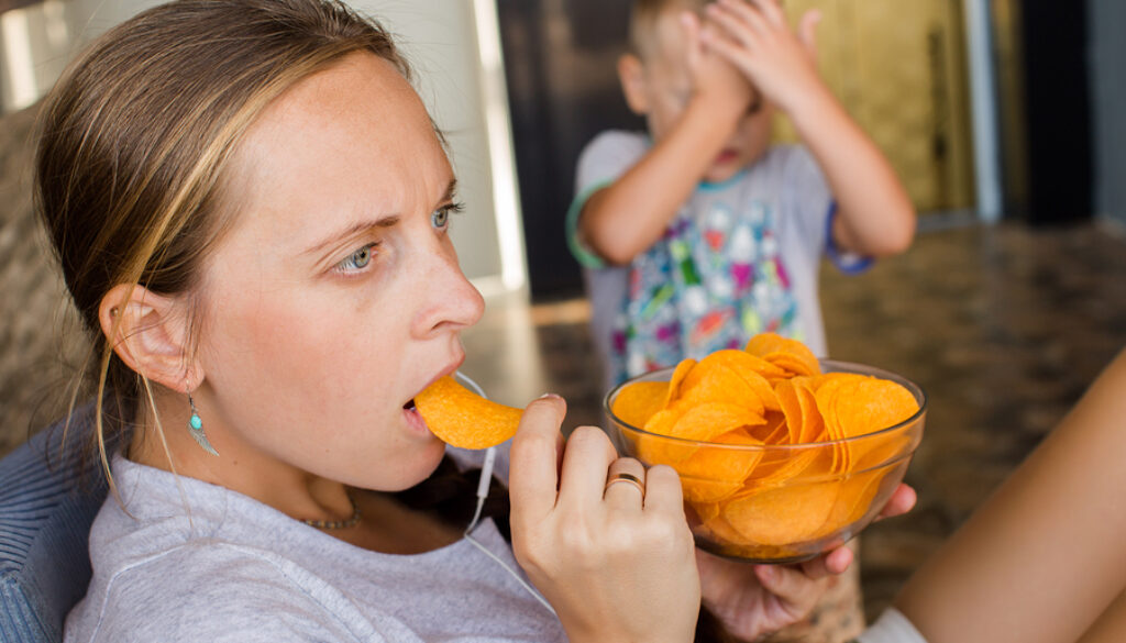 Woman Works At The Computer And Eating Fast Food. Unhealthy Life