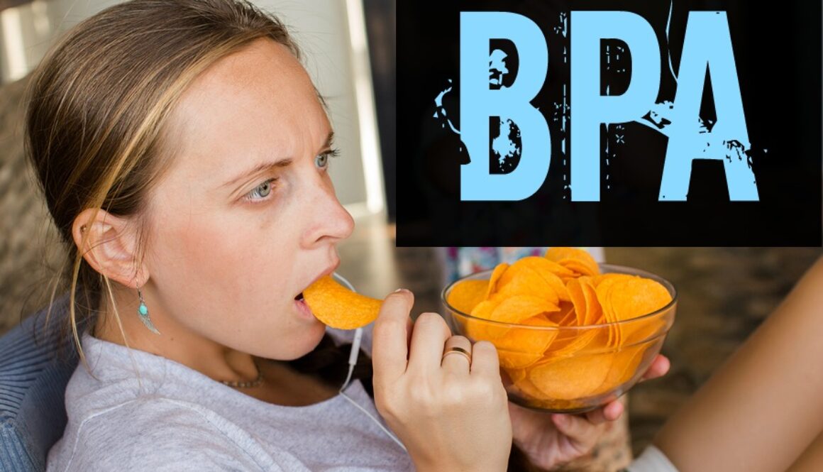 Woman works at the computer and eating fast food. Unhealthy Lifestyle