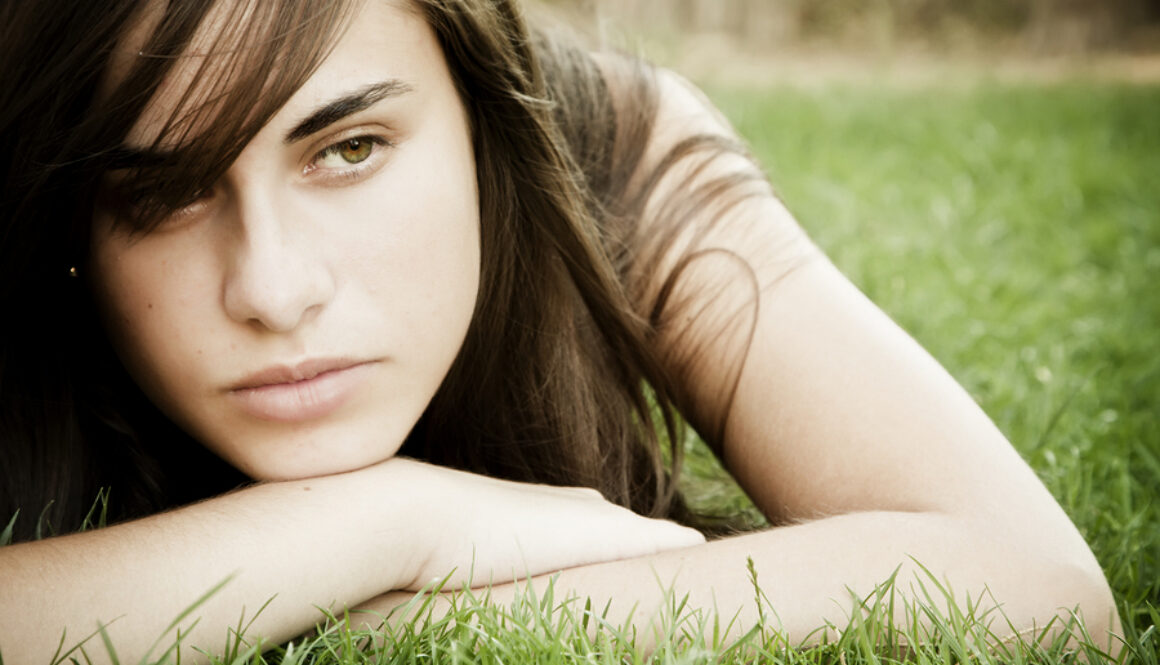Young pensive woman portrait