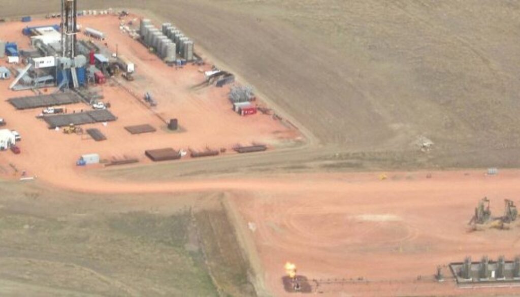 drill rigs and flaring in the Bakken over North Dakota__KAikin