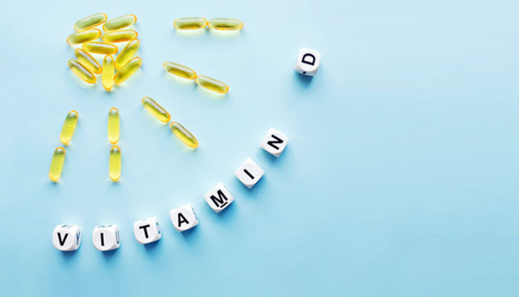 Yellow capsules in the form of the sun with rays and the word vi