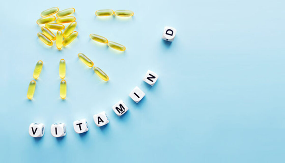 Yellow capsules in the form of the sun with rays and the word vi