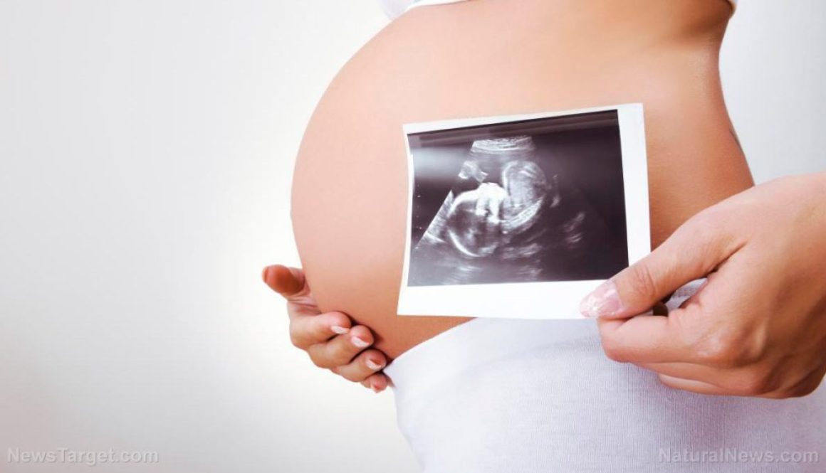 Woman-Pregnant-Ultrasound-Picture-Stomach