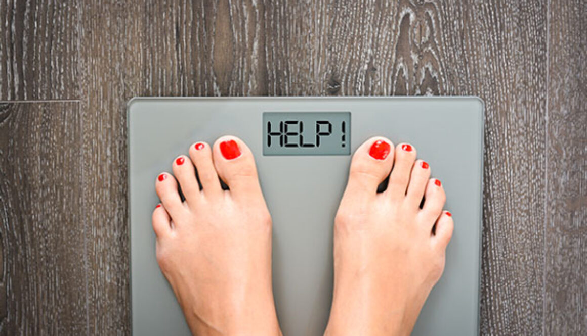 Lose weight concept with person on a scale measuring kilograms
