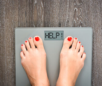 Lose weight concept with person on a scale measuring kilograms