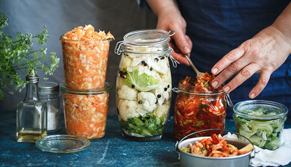 Canning fermented food in jars prep hand sauerkrauft kimchi bro