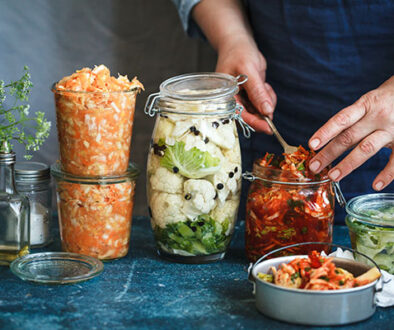 Canning fermented food in jars prep hand sauerkrauft kimchi bro